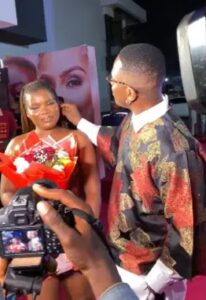 Timini links up with lady who wooed him for Valentine’s, gives her bouquet of flower