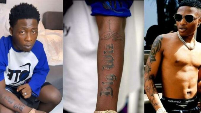 “Baba 20 meter don finish” – Speculations as GOE tattoos Wizkid’s name on his arm