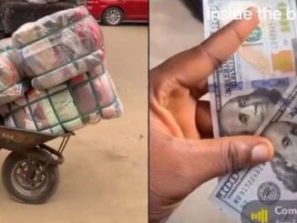 Okrika seller overjoyed as she finds $200 in bale of clothes